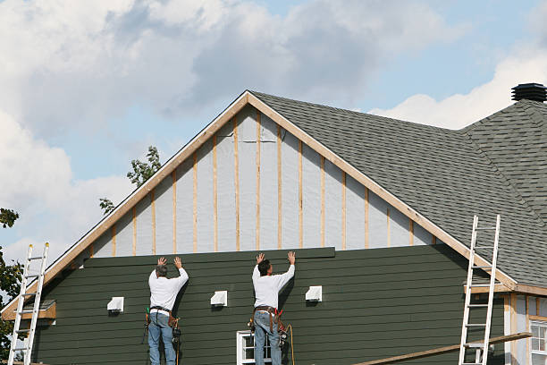 Professional Siding technician working in Newport, OH